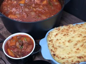 stoofschotel met kip en pompoen in rode wijn