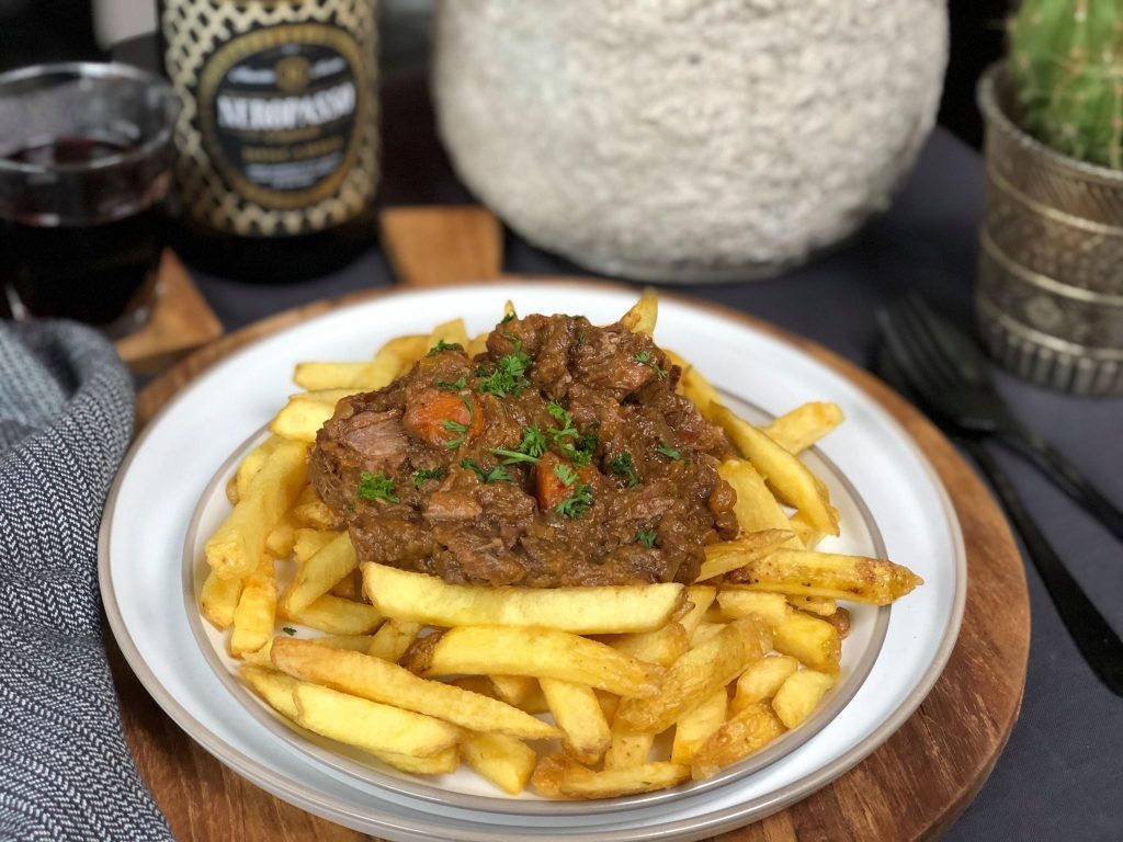 stoof varkenswangen met pompoen en rode wijn