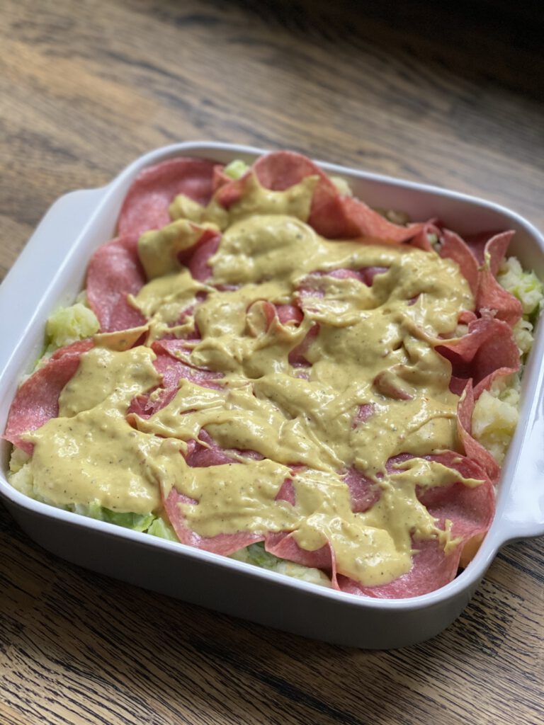 prei ovenschotel met bechamelsaus en salami 