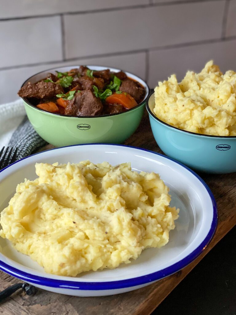 romige aardappelpuree bij wildzwijn stoof