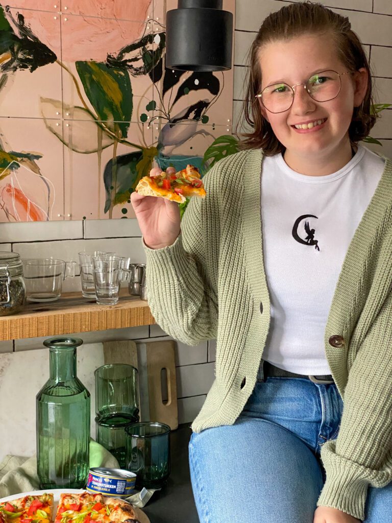 kinderen eten graag pizza