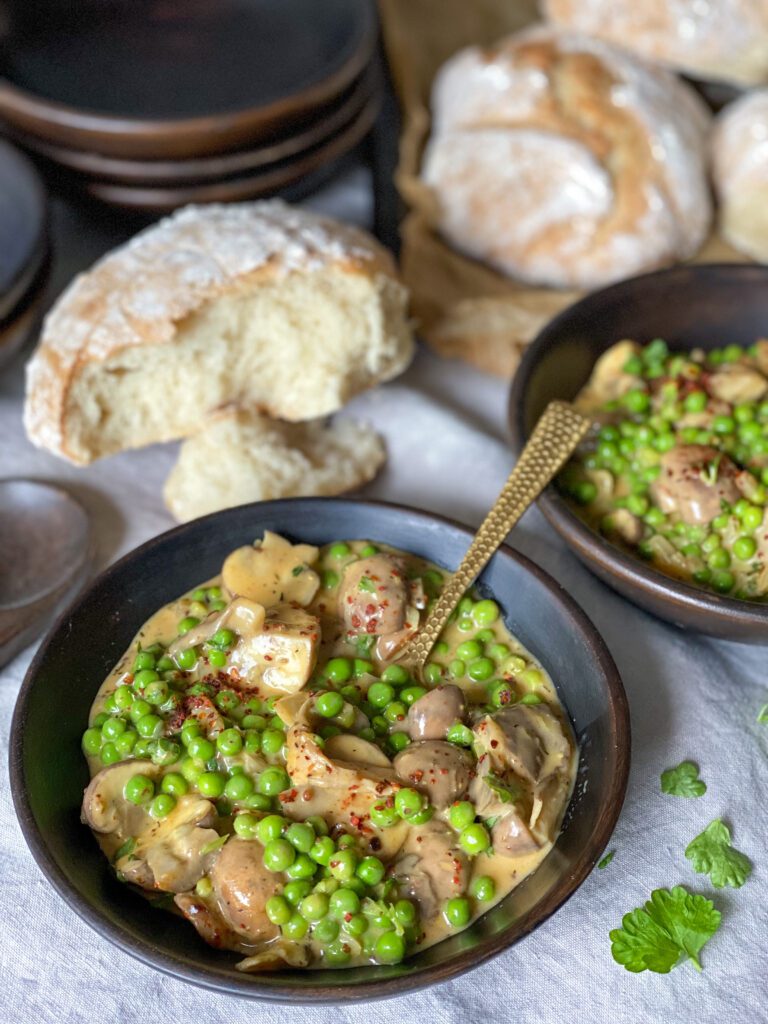 romige oesterzwammen stoof met doperwten