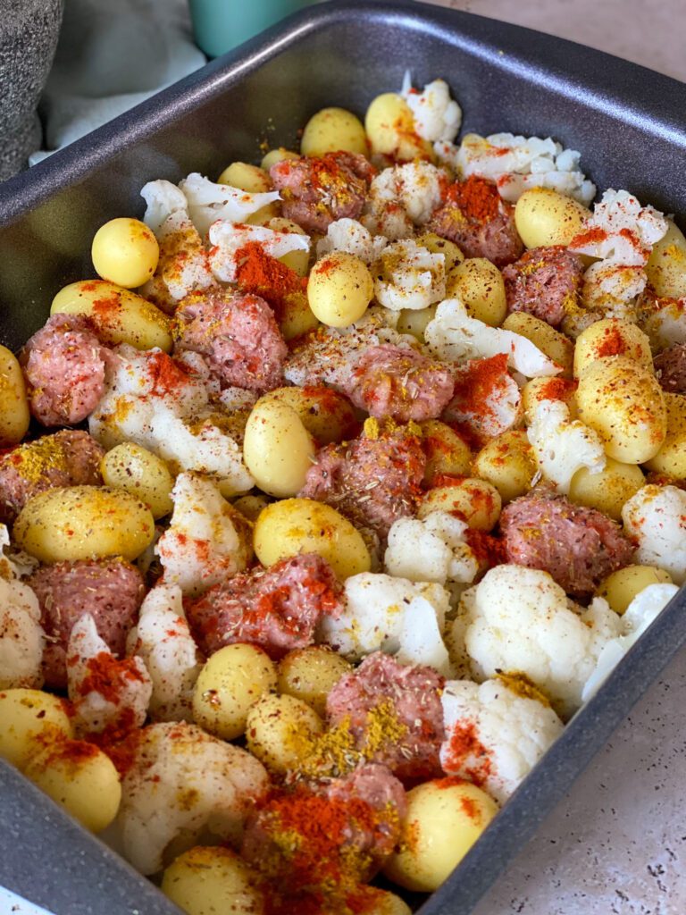 krieltjes ovenschotel met bloemkool en verse worst