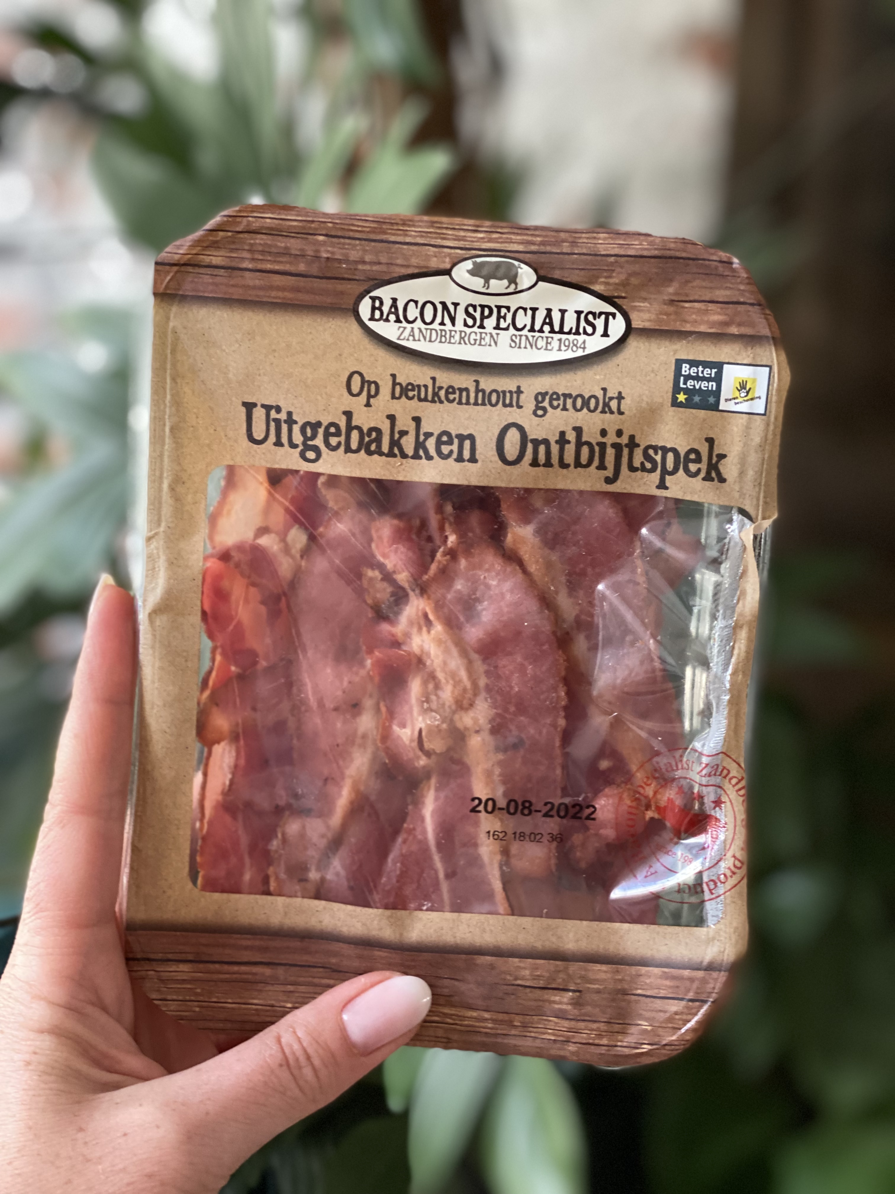 Spitskoolsalade met spek en ei