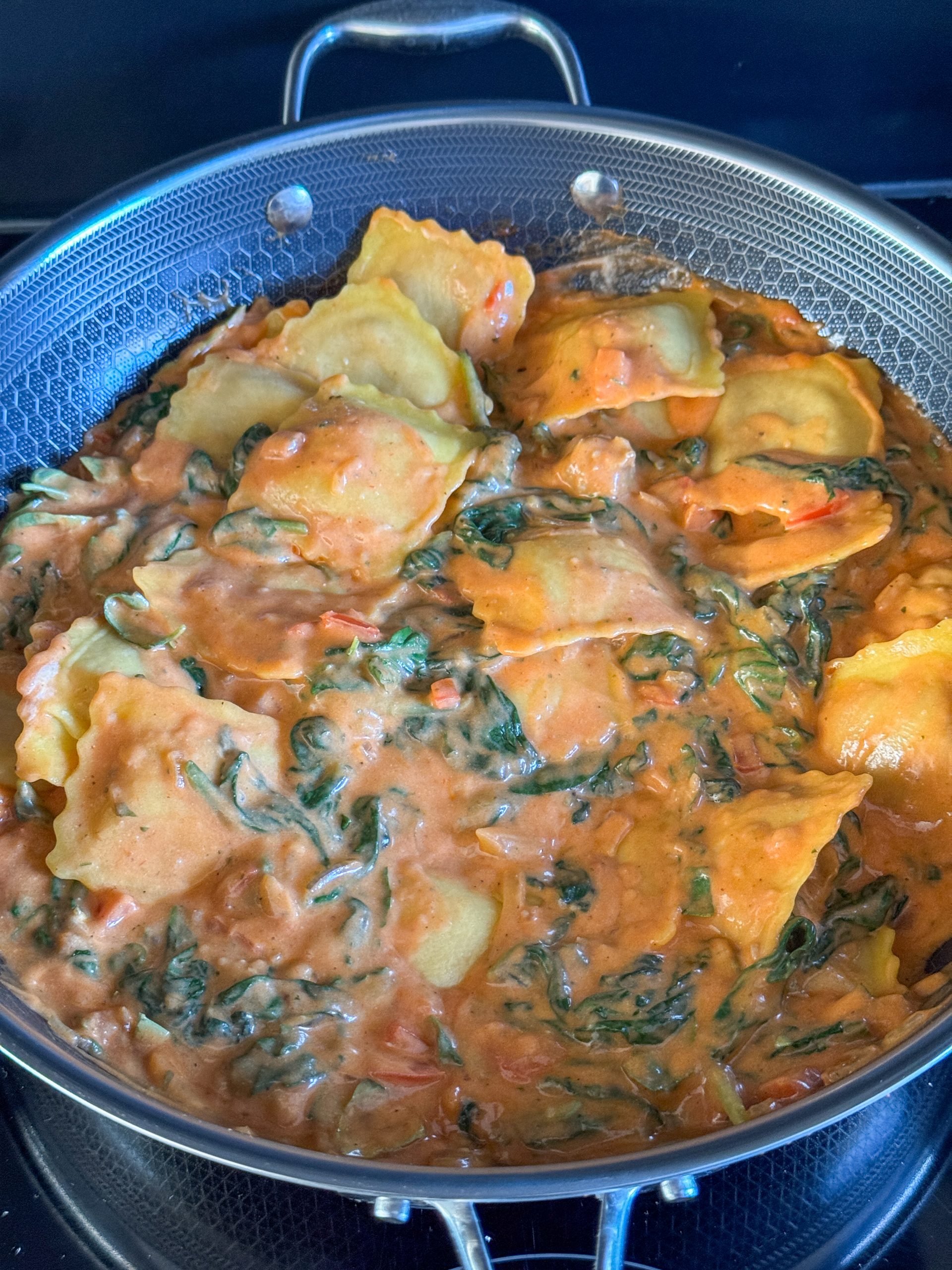 Romige ravioli ovenschotel met spinazie