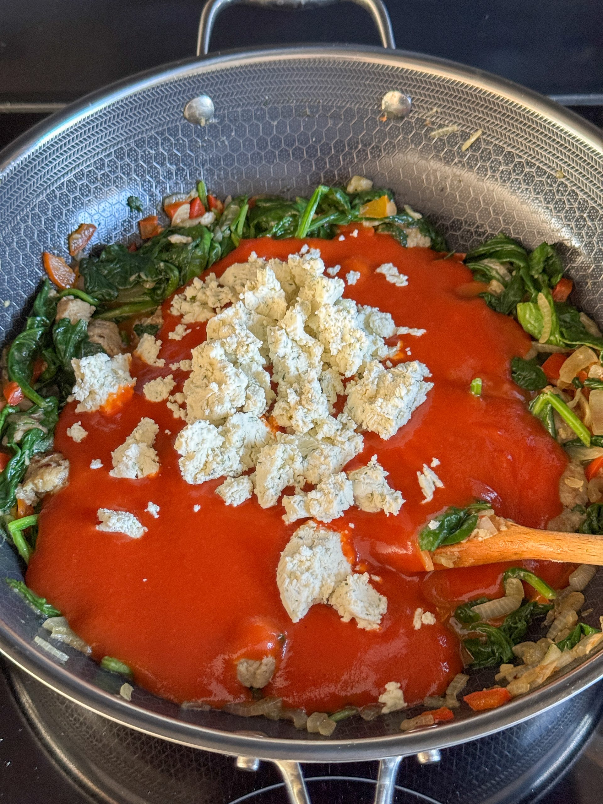 Romige ravioli ovenschotel met spinazie